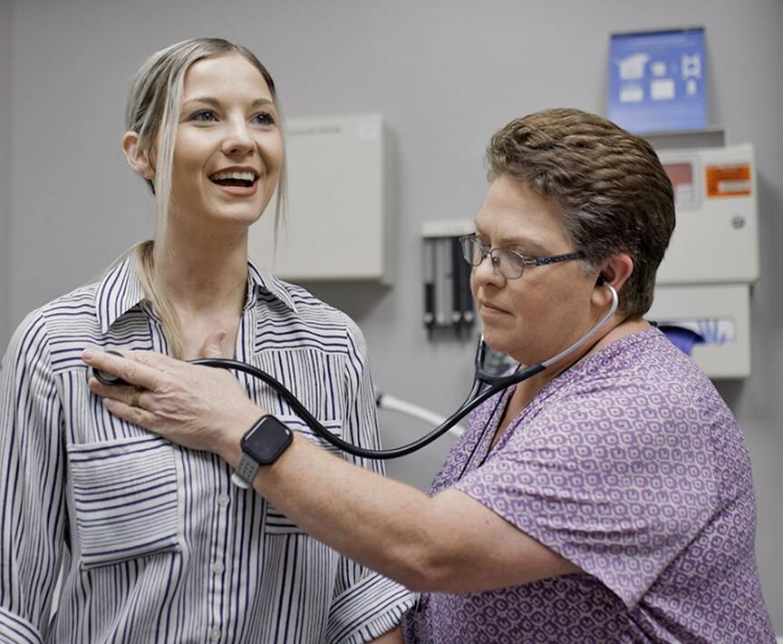 NeoHealth provider examining a patient